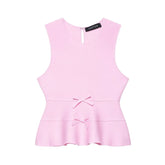 Pink sleeveless top with a bow detail